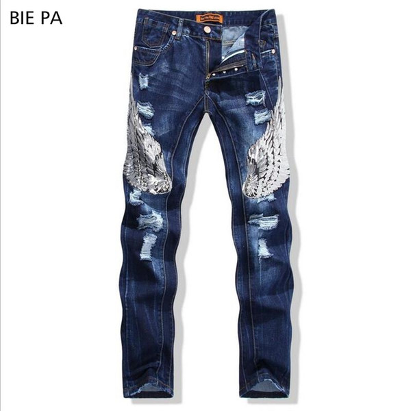 brand men jeans blue ripped and eagle wings of embroidery Movie stars same style high quality men jeans 588