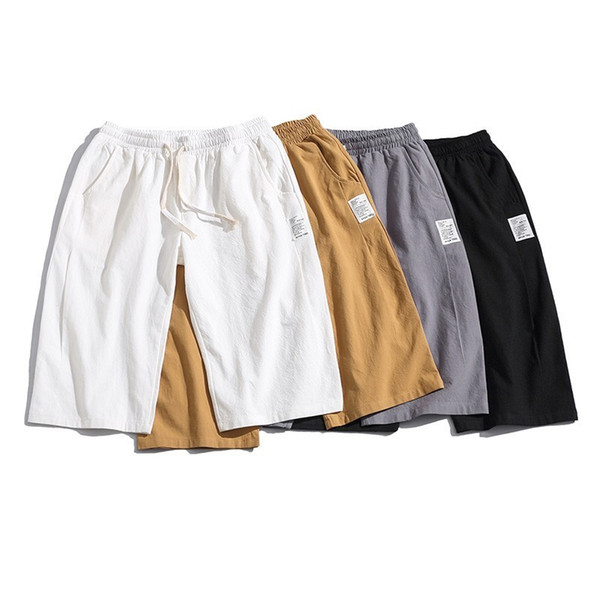 Men Hip Pop Fashion Solid Cotton Calf-Length Harem Pants Men Wide Crotch Loose Large Cropped Trousers Wide-legged Bloomers