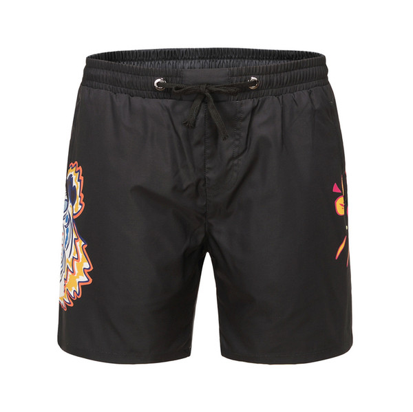 2019 hot new couple two-color tiger eyes print fashion trend breathable temperament simple casual wild couple swim trunks shorts