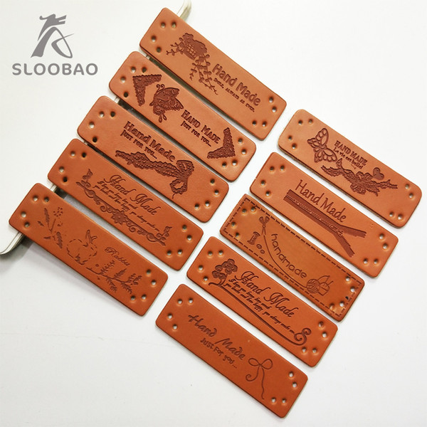 SLOOBAO 20 pcs a lot Hand made PU Leather labels for garment 50mm*15mm Square shape DIY sewing Labels Butterfly embossed