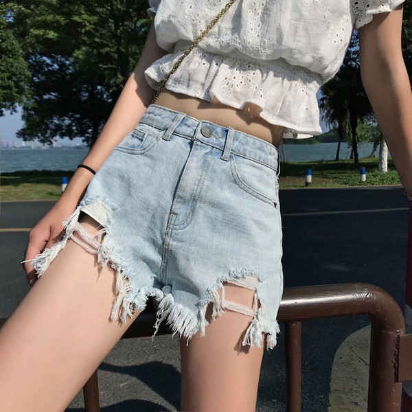 Korean version of the summer women's new high waist casual denim raw edge hole shorts hot pants