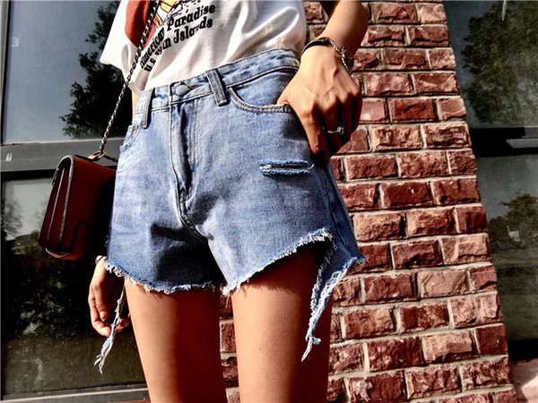 2019 Korean version of wild casual irregular trousers torn denim shorts