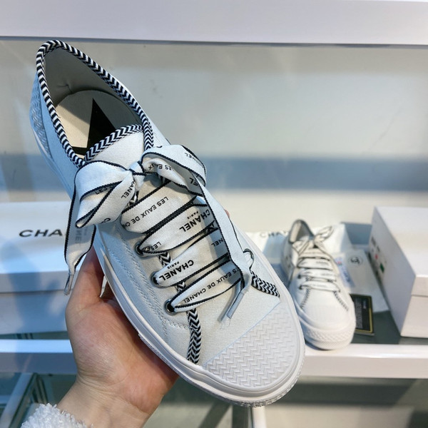 free shippingWomen's shoes 2020 spring new board shoes leather sneakers fashion wild lining sheepskin casual flat low-top canvas shoes2