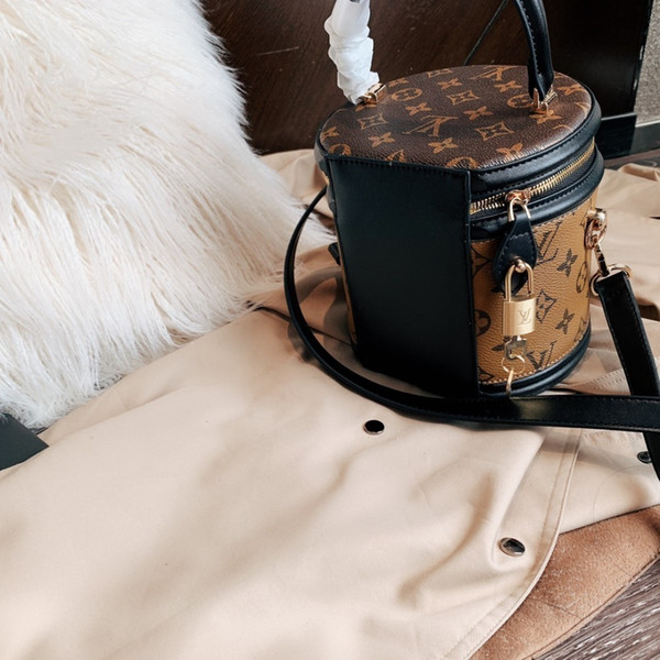 2019 New listing Free shipping women designer handbag genuine leather fashion top quality Cosmetic case shape bucket bagkid