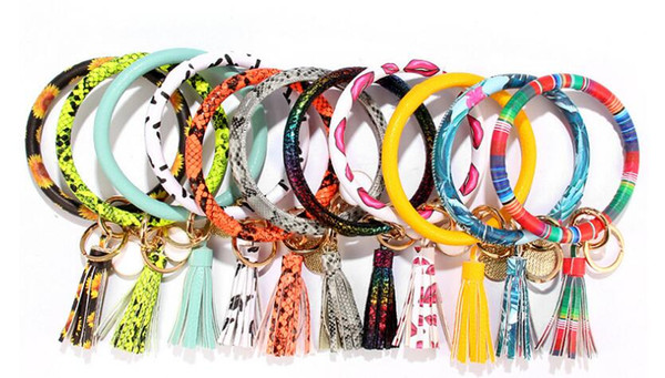 Free DHL Leopard Leather Bracelet Key Chain PU Wrist Round Tassel Pendant Wristbands Sports floral keychain bracelet key Rings 22 styles