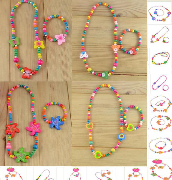 19 Styles Girl Necklace Children Toys Girl Necklace Bracelet Suits Hot Children Butterfly Flower Heart Different Wood Bead Necklace Bracelet