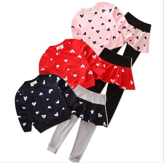 New children's clothes suit Korean version of the explosion of autumn girls cotton love long-sleeved sweater + skirt pants leggings suit