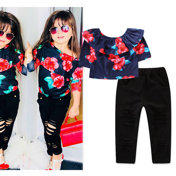 New children's clothing set European and American style spring and autumn tide girls flower print pattern + black hole trousers two-piece su