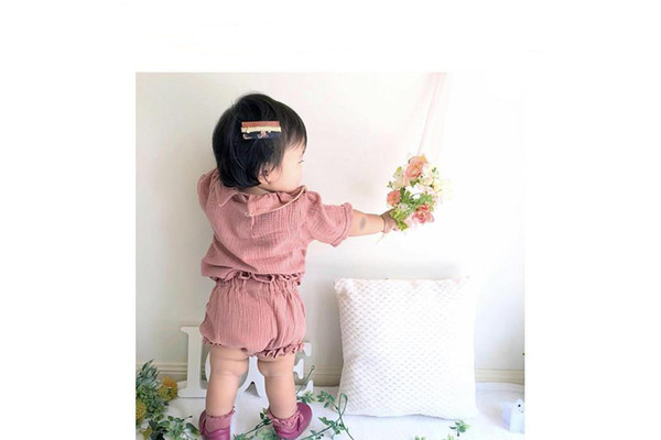 Summer new children's clothing set 2019 Korean version of the girl solid color lapel short-sleeved shirt + triangle shorts two-piece