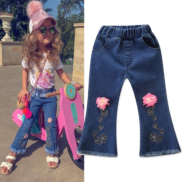 New children's clothing hot spring and autumn explosion models girls nine pants fashion wild embroidery flare jeans