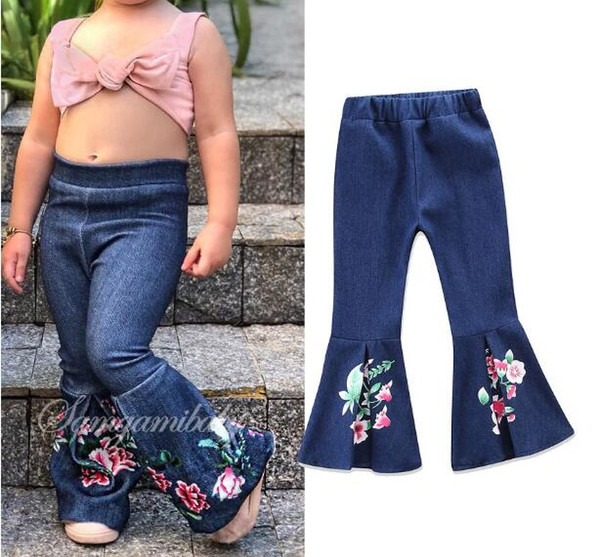 New children's children's fashion girls European and American style flower print blue denim trousers