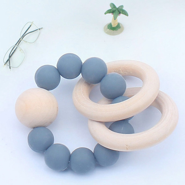 Baby Wooden Teether Bracelets Silicone Chew Beads Teething Wood Rattles Toys Baby Teether Soother Bracelets