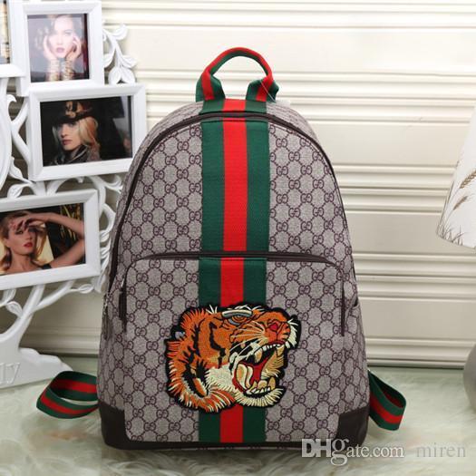 2018 New Fashion Men And Women Designer Backpacks Luxury G Embroidery Tiger Head Cat Head Men Women Rucksack Bag Charms