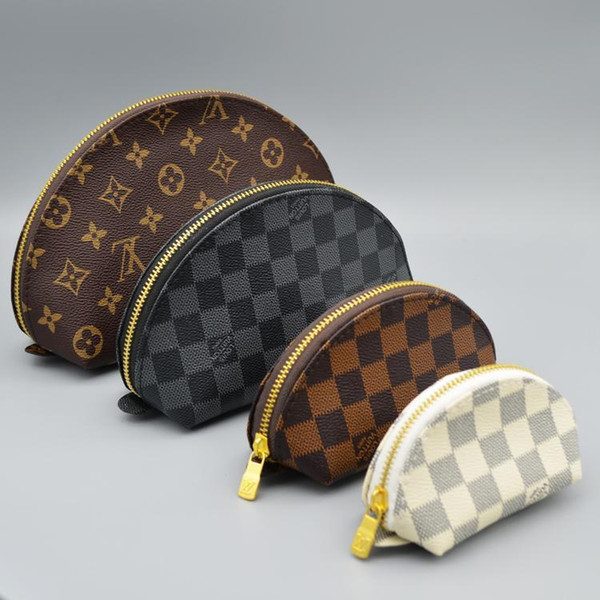 High quality lattice stitching zipper oval coin purse men and women fashion personality four-piece storage bag small round bag brabd