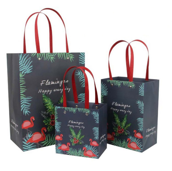 12pcs/lot 31*24*13cm Vertical Handle Gift Bag clothes package Handbag solid color with letters Flamingo flower bear Paper Bags