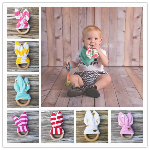 Vieeoease Baby Teething Ring Fabric and Wooden Teething Training with Crinkle Material Inside Sensory Toy Natural teether Bell EC-842