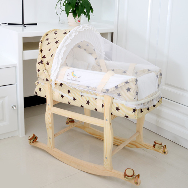 High-quality baby cradle basket with mosquito nets two-way swing wooden wheeled the baby sleep basket of neonatal bed