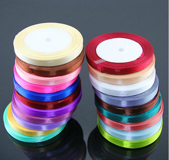 15% off 2015 new 22M*1CM Ribbon Single Face Satin Ribbon Rolls Webbing Decoration Candy Box Packaging 24 Colors 25 yard/roll 1250yards