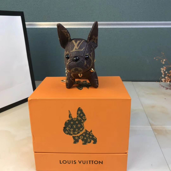 Wholesale luggage manufacturing toy dog Europe and America rivets fashion personality pendant wealth dog free shipping