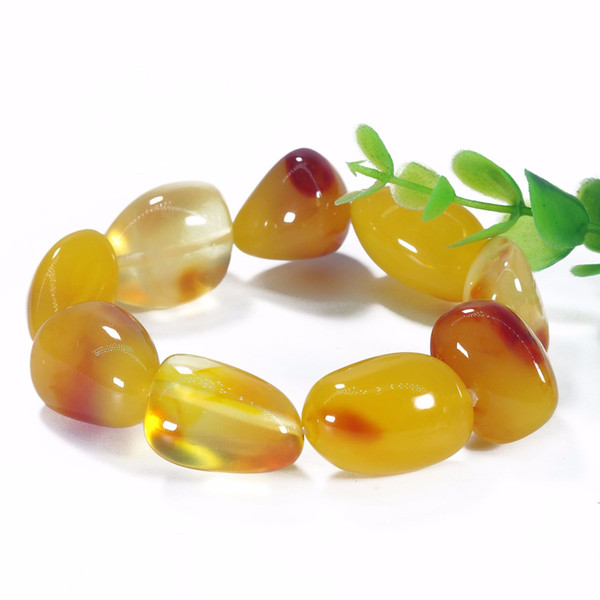 Honey wax accompanying fluorescent float multi-color golden jacketed amber with honey wax for men and women