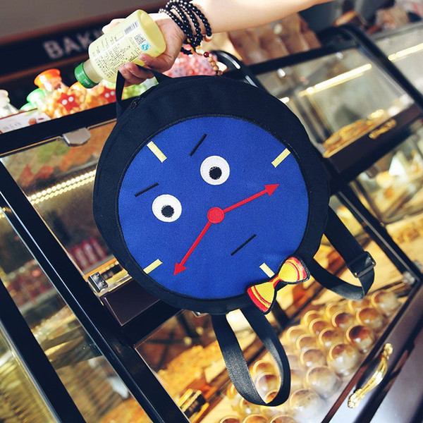 New style Cute cartoon Children's locomotive backpack Embroidered small hand backpack Bow tie clock style Double color