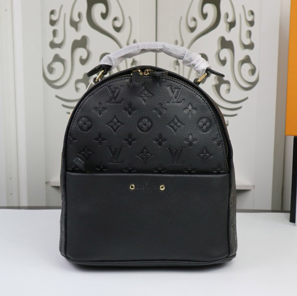 High quality designer fashion mini backpack luxury brand laser diagonal bag ladies classic leather Backpack Style 24 * 27 * 14cm Model:44019