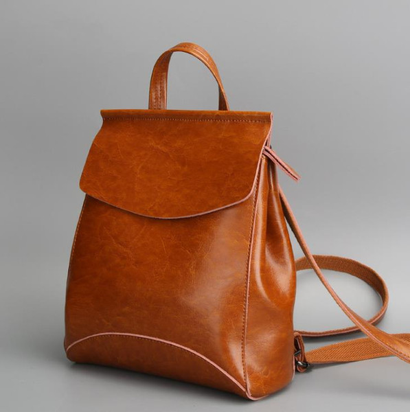 Men and women fashion leather designer backpack lovers wild leather computer backpack simple retro student book diagonal cross bag handbag