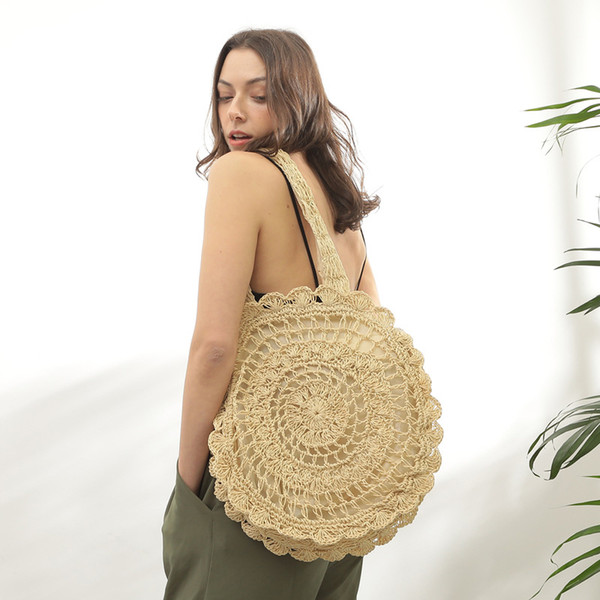 hot selling hollow out designer summer holiday ladies straw round tote shoulder bag women crocheted woven braided beach shopper handbags