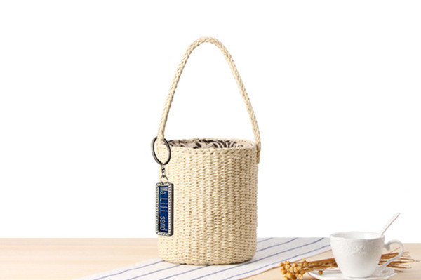 2018 Anti-Lost Hand Bucket Bucket Straw Bag Handmade Paper Rope Woven Beach Bag Simple Casual Handbag