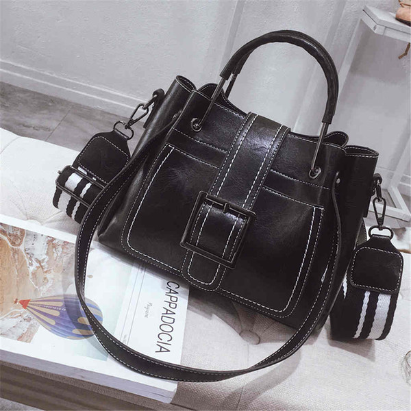 2018 Korean Version Of The New Retro Wild Bucket Bag Wide Shoulder Strap Shoulder Bag Messenger Bag Portable Handbag