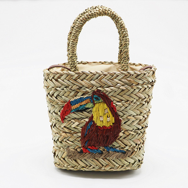 Embroidered handmade environmentally-friendly straw bag summer fashion wild hand-woven bag shoulder slung beach bag wholesale