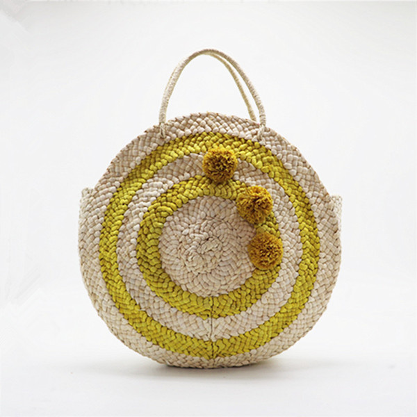 2018 new sleek minimalist round straw bag green two-color handbag corn puffer grass weaving European and American wind handbags wholesale