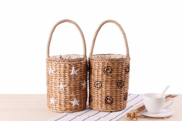 Wholesale 2018 portable bucket woven bag Handcuffs hand embroidered stars smiley straw bag summer vacation beach bag