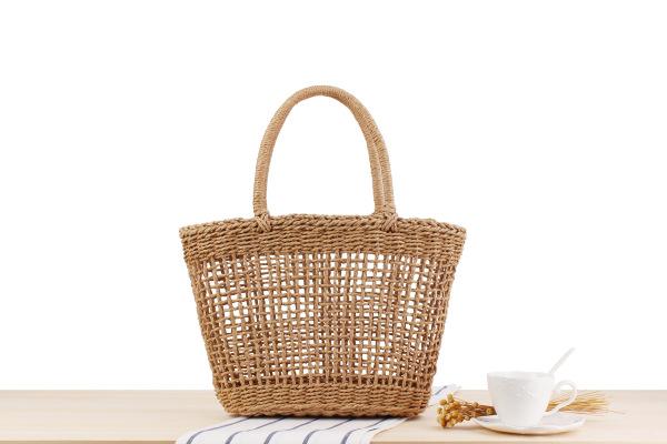 Wholesale and retail super fire portable new hollow woven bag holiday travel basket tide personalized straw package