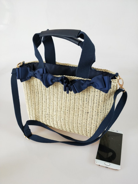 Wholesale 2018 pastoral style new paper rope bow bag shoulder slung environmental protection straw bag fashion wild beach bag