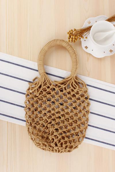 Wholesale and retail new solid color net bag hand-woven bag Sen series hand cotton line handcuffs holiday beach bag