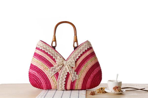 Wholesale 2018 Europe and the United States new lace bow straw bag color striped handkerchief beach bag exquisite woven handbag