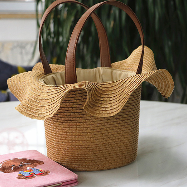 Wholesale 2018 European and American pastoral style lace hat-shaped fashion straw bag simple shoulder woven bag holiday beach bag