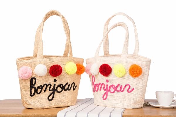 Wholesale 2018 new one-shoulder straw bag hand embroidered letters beach bag wool ball summer holiday woven bag