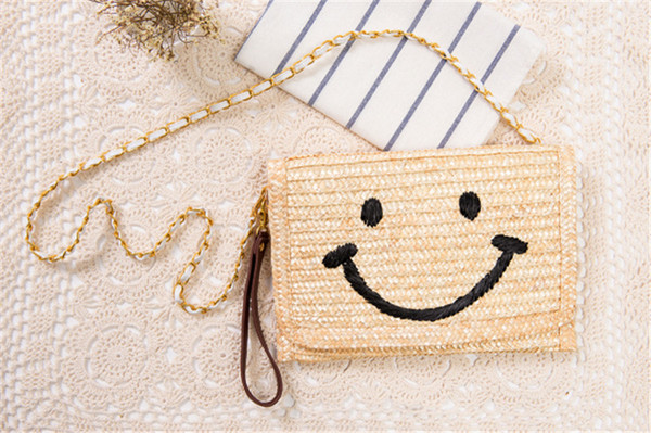 Wholesale 2018 new personality smiley shoulders Crossbody straw bag handcuffs dual-use woven bag fashion simple women's bag