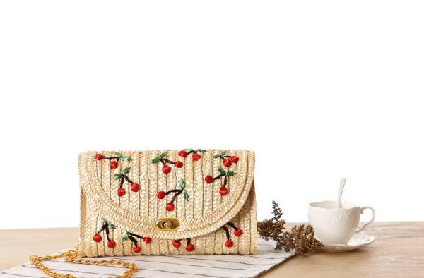 Wholesale 2018 new Japanese three-dimensional hand-embroidered cherry straw bag woven bag Sen female fruit beach bag