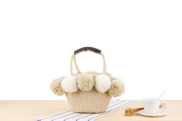 Super cute hand-woven woven beach bag cute hit color large wool ball straw bag small fresh leisure bag