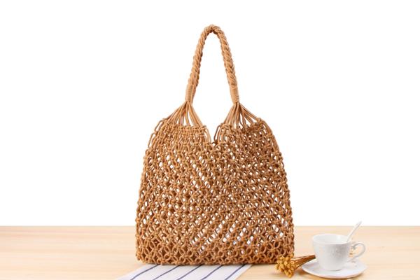 Wholesale and retail new solid color one-shoulder woven bag tide female Sen grass straw package hand-made cotton rope net bag beach bag