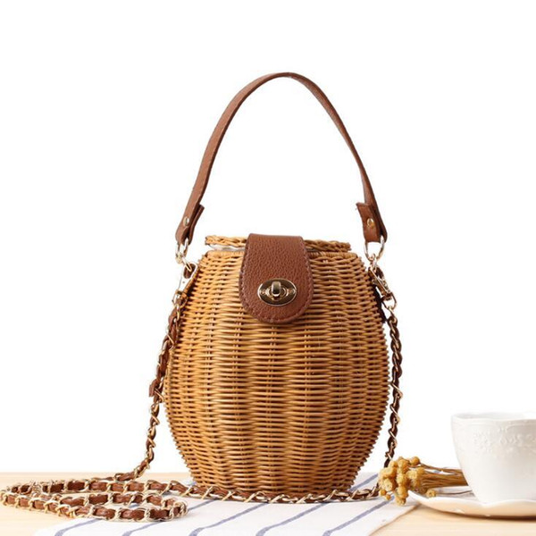 Factory wholesale women handbag fashion woven bucket bag new Japanese small fish basket lock handbag small fresh rattan woven chain bag