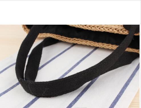 Wholesale 2019 Europe and America portable bucket woven bags handcuffs black ribbon straw bag summer vacation photo Women girls beach bag