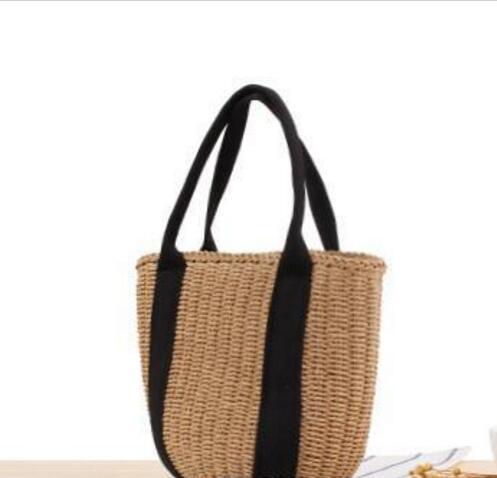 Wholesale 2018 Europe and America portable bucket woven bags handcuffs black ribbon straw bag summer vacation photo Women girls beach bag