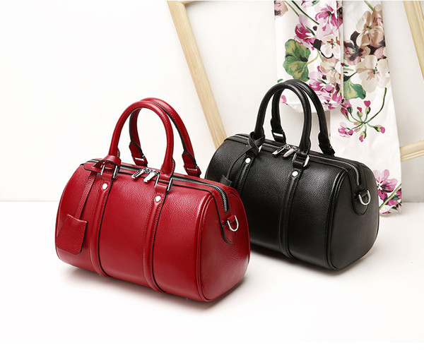 New 2019 women's bag in leather fashionable European and American first layer cow leather bag Boston one-shoulder hand-held women's bag