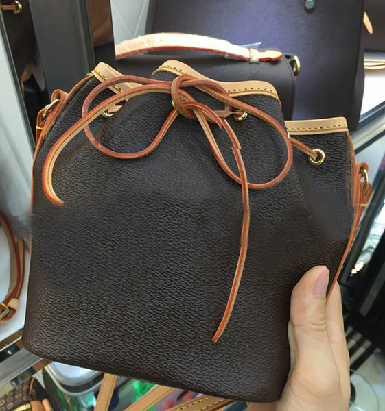 Free shipping ! Fashion Leather Bucket Bags for Women Small Mini Cutout Women Messenger Bag M41346