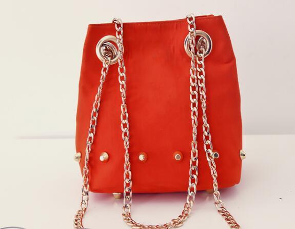 New hot spring summer new frosted Mini bucket bag bag shoulder bag cross rivet