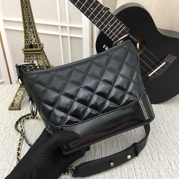 2018 Ladies four seasons hot style cowhide bag,brand name slanting bag,high quality luxury can be slanted across the shoulder,size 20*15*8CM